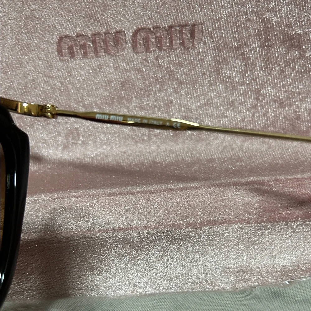 Miu Miu Black Frame Sunglasses with Brown Gradient Lenses - Picture 4 of 5